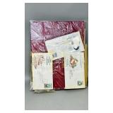 binder of world stamps, envelopes, & loose stamps