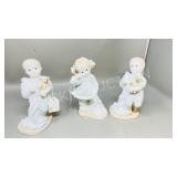 3- porcelain figurines