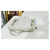 Brookstone portable massage unit - working