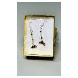 pair of 925 sterling earrings w/ red stones
