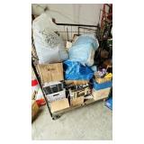 large cage of mixed household items