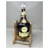 vintage B&B liqueur bottle in wood & gold stand