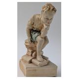 Vintage Chalkware Boy Sitting on Books Figurine