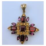 10K Gold Garnet Cross Pendant 1' x 1'. 5.131 grams