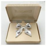 Inï¿½Vestï¿½Ment Silver Bow Pin