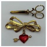 2 Golden Pins/Brooches