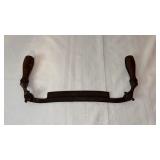 vintage woodworking tool is a draw knife