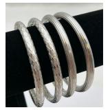 4 Vintage Silver Tone Bangles