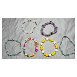 6 Multicolored Beaded Bracelets
