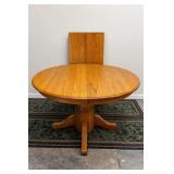 Oak Round Pedestal Dining Table w/ 2 Leaves