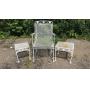 White wrought iron chair and tables