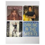 Four 45 RPM Vinyl Records By Various Artists