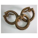 Three Gold Decorative Door Rings