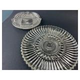 Two Clear Glass Dishes With Star Design