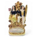 Antique Staffordshire Couple Figurine
