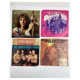 4 Vinyl 45 RPM Records With Sleeves