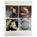 4 7-Inch Vinyl Records With Covers