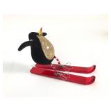 Penguin Figurine On Red Skis