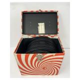 45 RPM Vinyl Records In Spiral Case