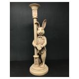 Rabbit Figurine Holding Lamp Post