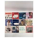 12 Assorted Vinyl Records With Sleeves