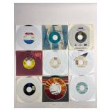 9 Assorted 45 RPM Records With Sleeves