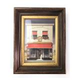 Framed Artwork Of Storefront With Red Awnings
