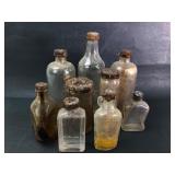 8 Glass Bottles With Cork Stoppers