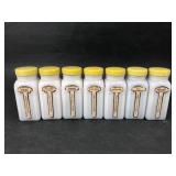 7 Griffithï¿½s Milk Glass Spice Bottles