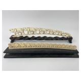 Carved Elephant Figures On Wooden Bases