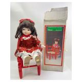 Porcelain Doll W/Chair By Christmas Around The Wor