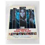 The Stewardess Is Flying The Plane by Ron Hogan