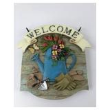 Welcome Sign With Watering Can & Flowers