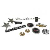 Assorted Vintage Automotive Emblems and Badges