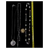 Three Necklaces & Sunburst Brooch