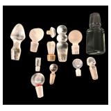 Assorted Glass Bottle Stoppers and Small Bottle