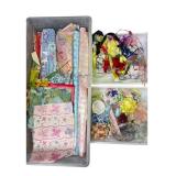 Assorted Gift Wrapping Paper, Ribbons, and Bows