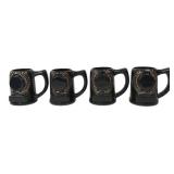 Set of Four Black Ceramic Mugs with Laurel Motif