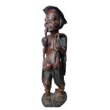 African Carved Wood Figure with Pipe & Fish 25H