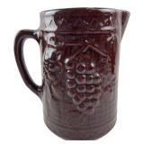 Brown Glazed Stoneware Grape Motif Pitcher