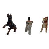 Three Miniature Glazed Porcelain Dog Figurines