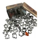 Assorted Metal Cookie Cutters in Fruit Tin