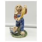 Dog Figurine Holding a Fish