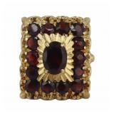 JEWELRY. 13.5kt Gold and Garnet Cocktail Ring.