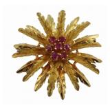 JEWELRY. 18kt Gold and Ruby Starburst Brooch.