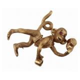 JEWELRY. 14kt Gold and Ruby Monkey Brooch.