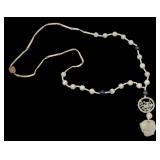 JEWELRY. Carved Celadon Jade Necklace.