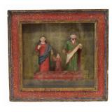 Shadow Box of Santos Figures.