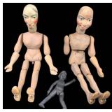3 Carved Wooden Jointed Dolls .