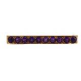JEWELRY. 13kt Gold and Amethyst Bar Pin.